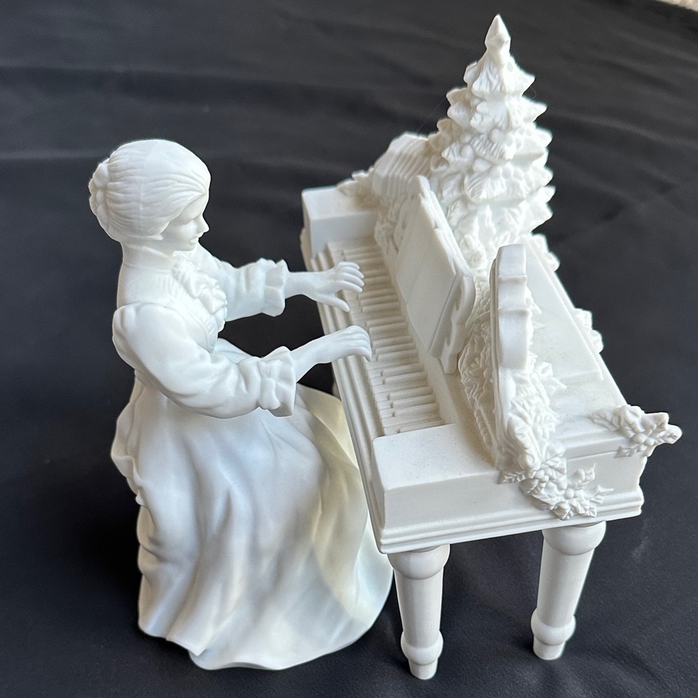Department 56 EUC white matte porcelain 2 piece piano & player figurine set.
